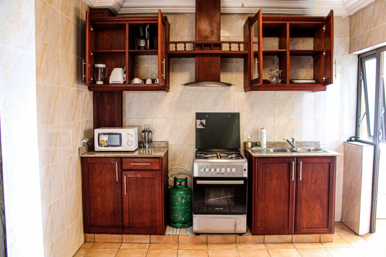 Residence Le Carat Bonapriso Douala Bagian luar foto