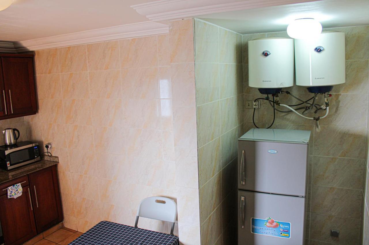 Residence Le Carat Bonapriso Douala Bagian luar foto